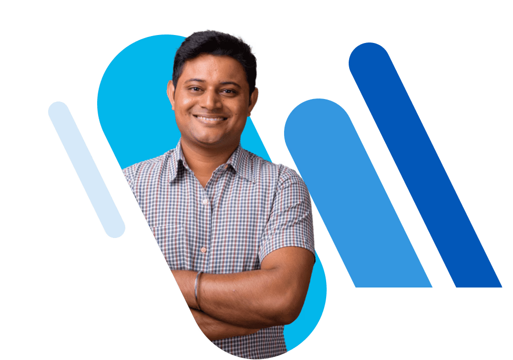 Smiling middle-aged man standing with his arms crossed